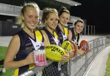 Footy bursts through pink banner