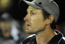 Team steps up as coach steps down