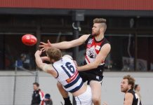 Bubb hangs up footy boots