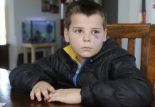 Child bashed in broad daylight