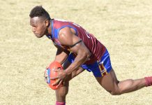 Lions clinch top spot