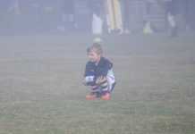 Players and parents brave fog
