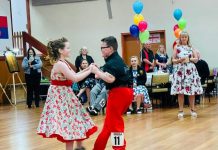 Twins love rocking and rolling