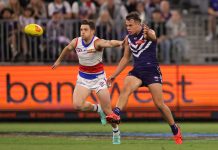 Making their mark: Binns and Simpson make AFL debuts