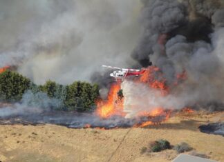Southeast firefighters join forces to battle major blaze in North